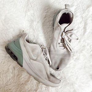 white and blue/teal worn nike shoes. decent condition. size 8